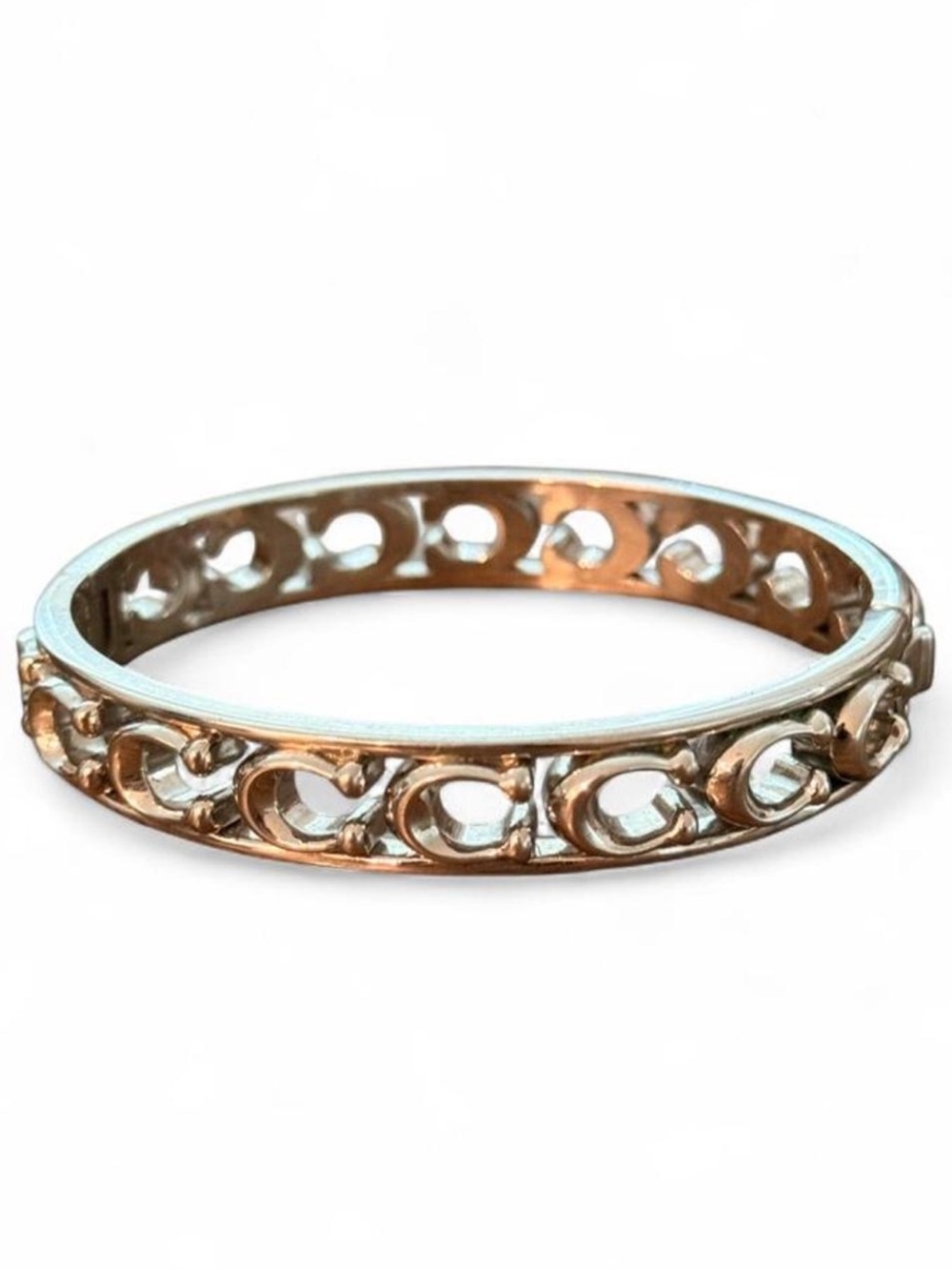 Coach | Silver Cutout Monogram Signature C
Hinged Bangle Bracelet